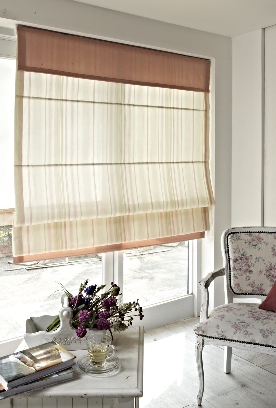 Roman blinds — soft fabric that folds into neat pleats when raised