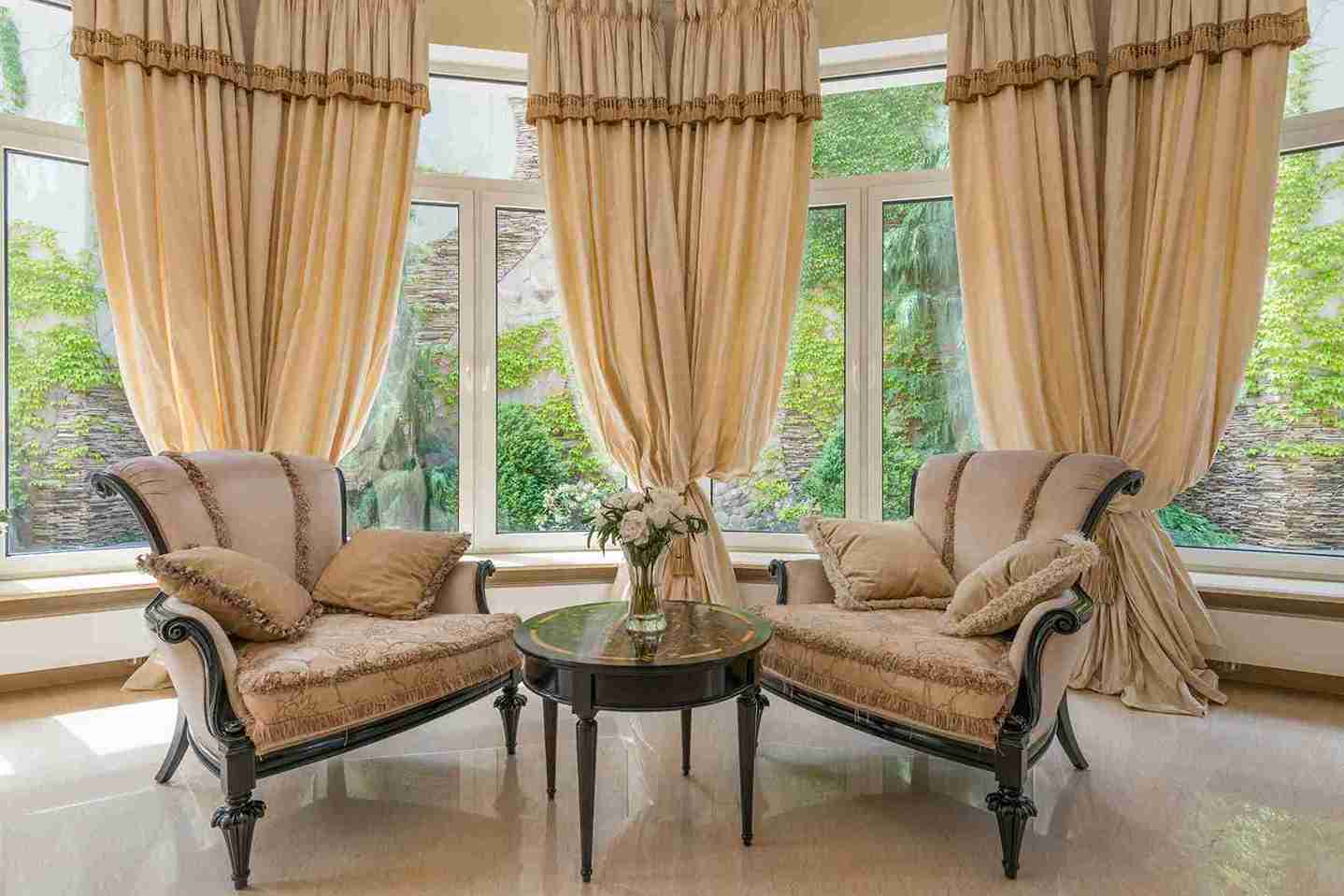Dramatic floor-to-ceiling white sheers in a grand luxury interior — Veloura Drapery signature look