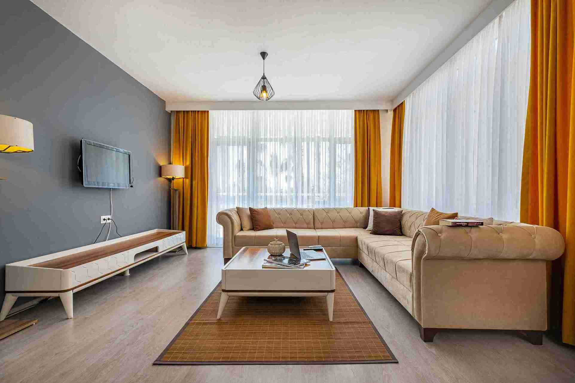 Designer patterned textured curtains adding richness to a classic interior — Veloura Drapery