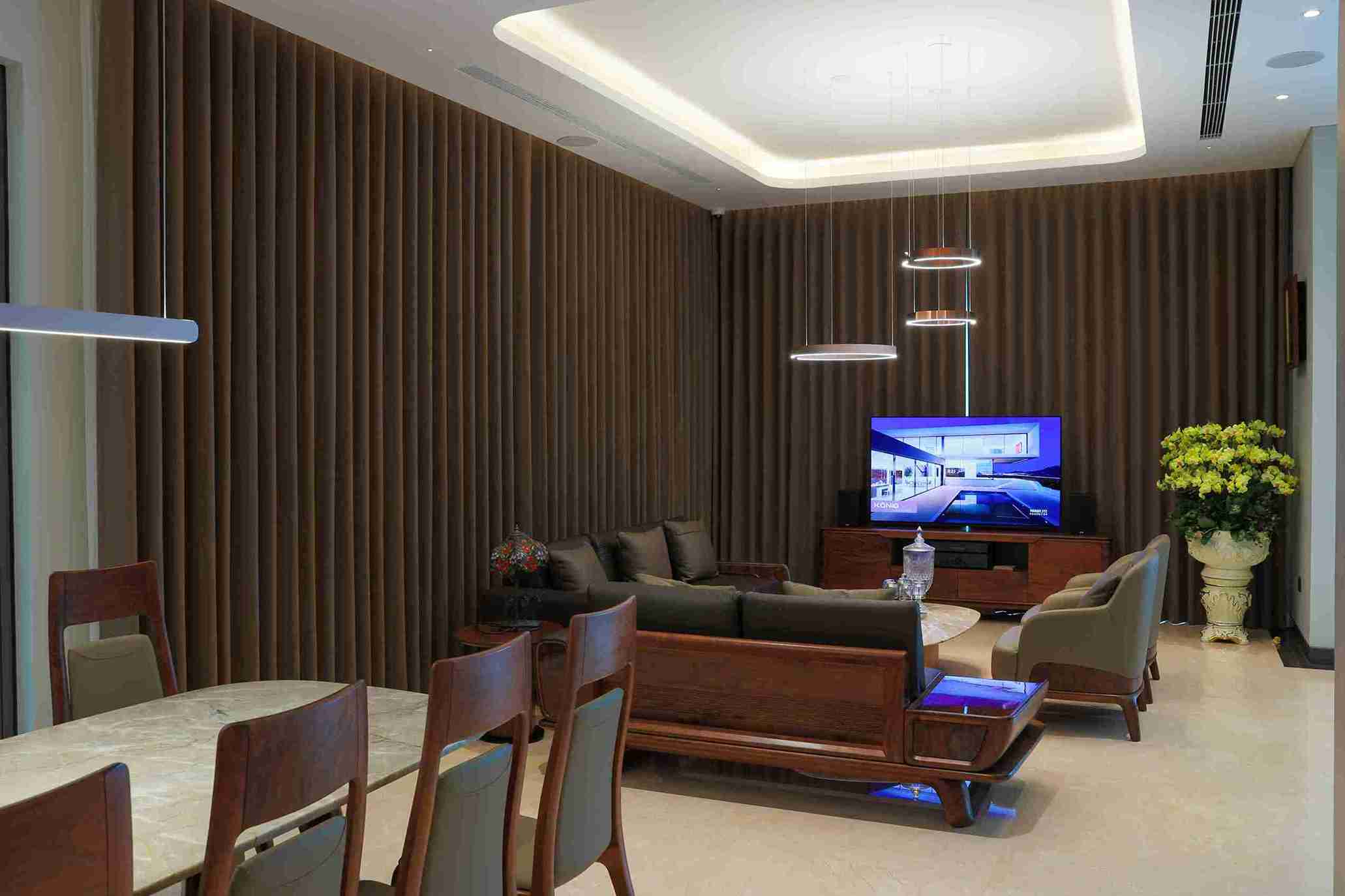 Rich brown blackout drapes in a luxury villa interior — Veloura Drapery