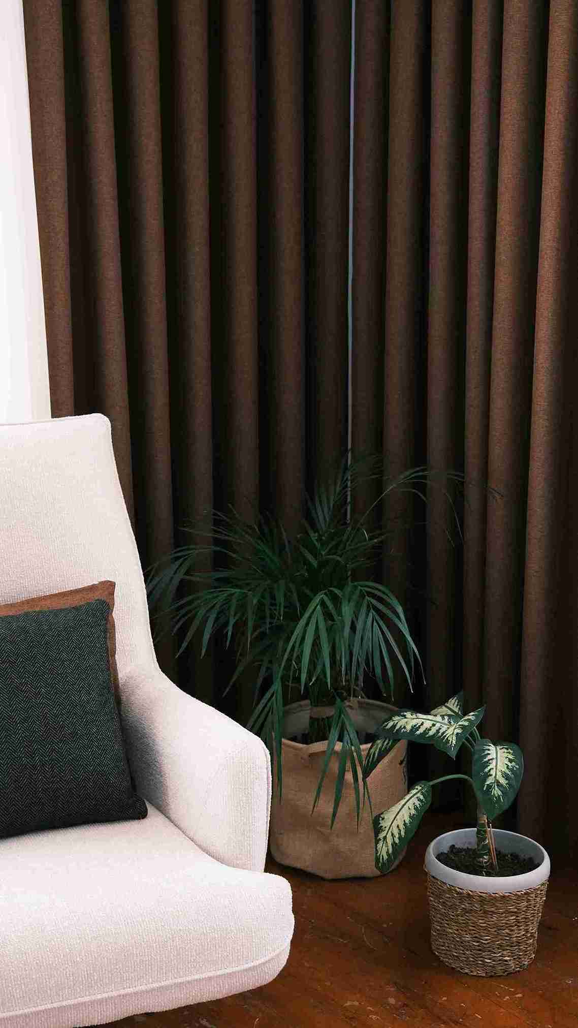 Cream silk drapes in a grand villa window bay — Veloura Drapery signature styling